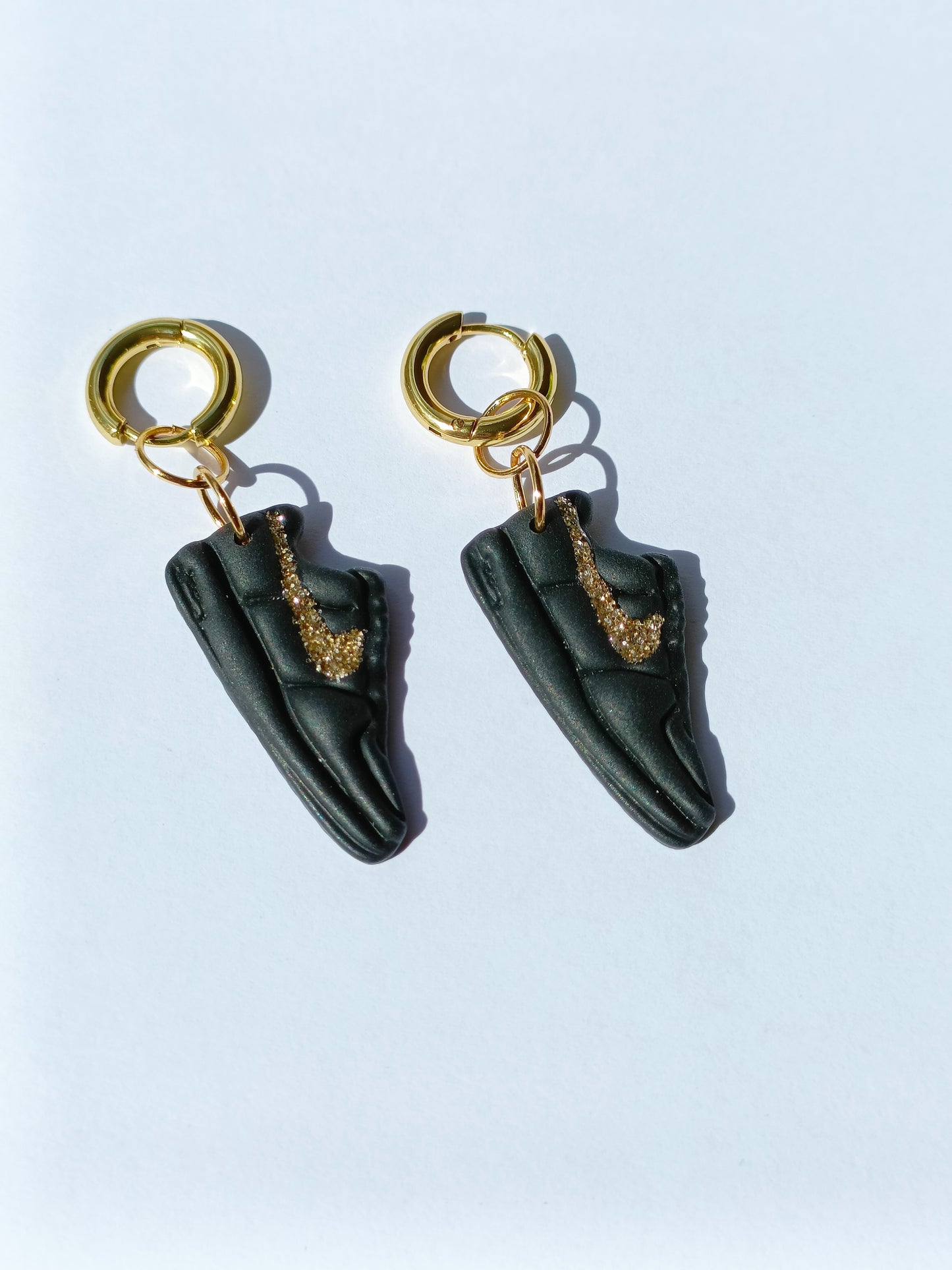 Nike Pendente Nero Oro