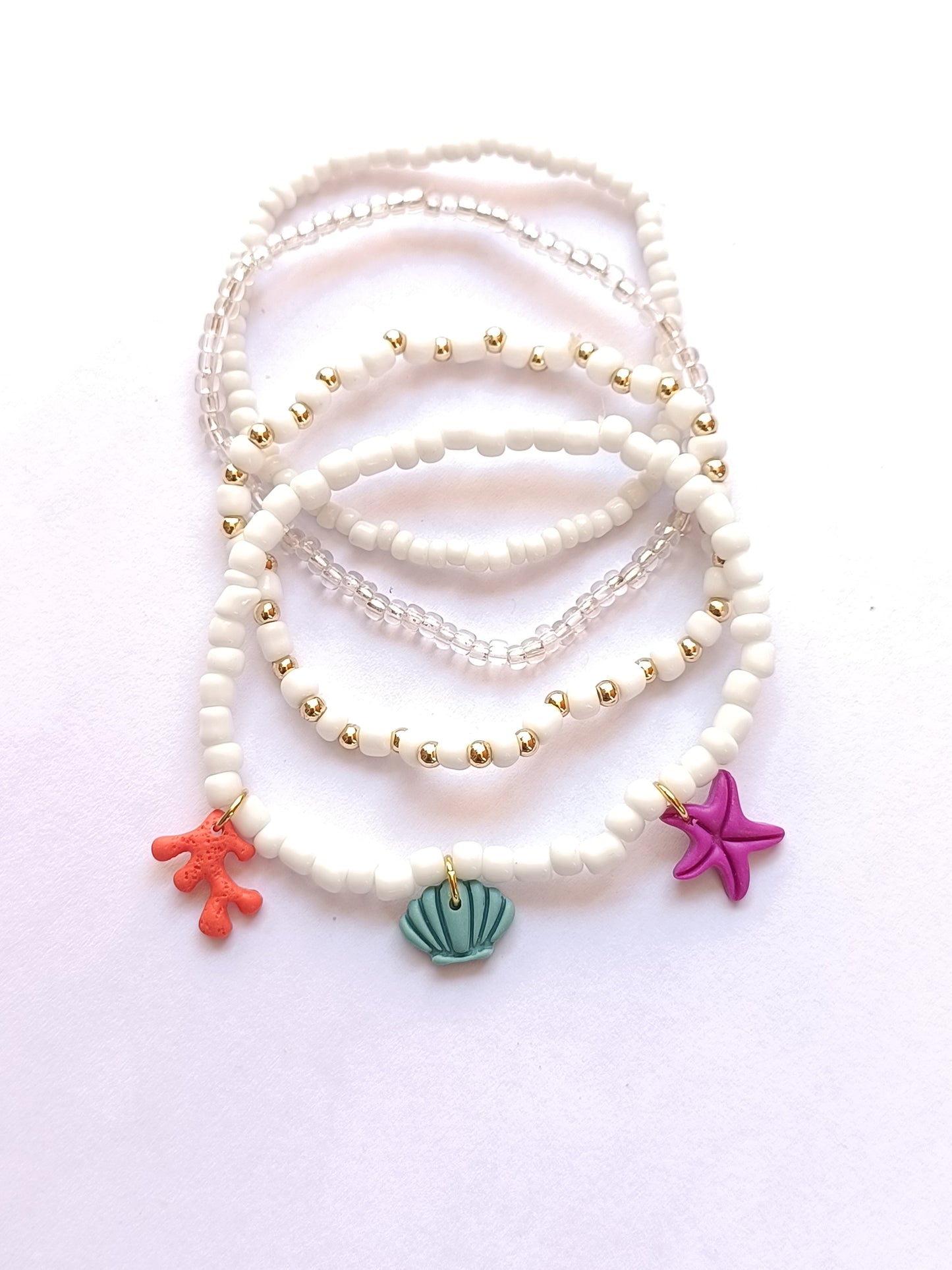 Collana bianca oro soggetti marini(in regalo i bracciali abbinati)