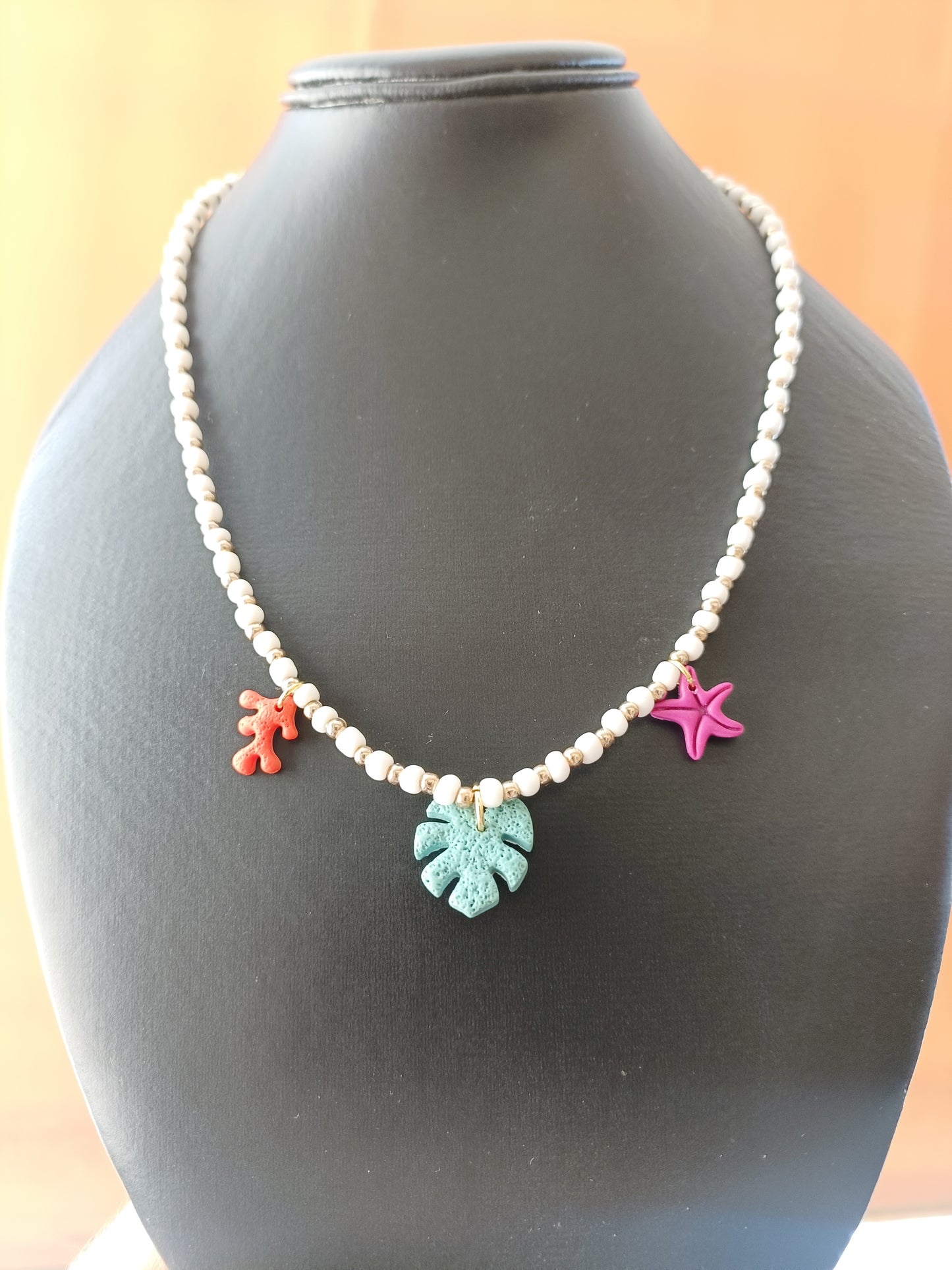 Collana bianca oro soggetti marini(in regalo i bracciali abbinati)